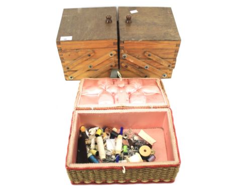 A vintage pine cantilevered sewing box and a wicker sewing basket and contents. 