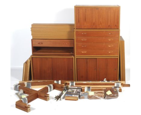 A Danish 1960s PS System modular stacking unit. Comprising: a unit with four long drawers, two cupboard units with sliding do