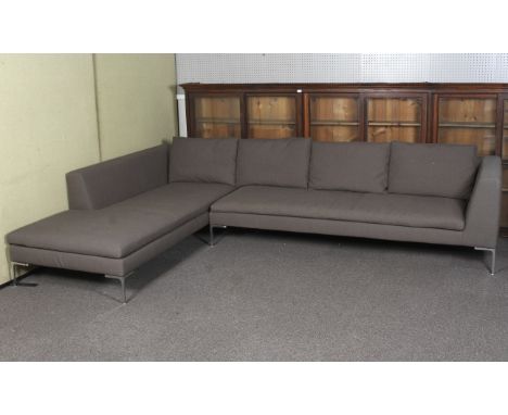 A Max Alto corner sofa by Antonio Citterio upholstered in grey. With drop-in cushions and scatter cushions, 380cm x 250cm x 7