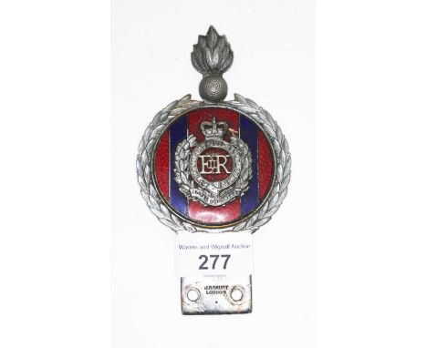 A Royal Engineers British military badge, blue and red enamel on cast metal, marked B/609 J.R.Gaunt, London.  