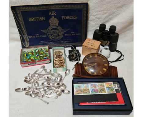 A box of collectables to include a British Air Forces illustrated booklet, box of marbles, collection of plated teaspoons, bi