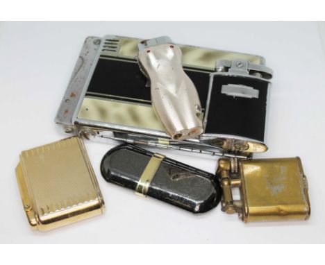Six vintage cigarette lighters including Ronson, Colibri etc.  