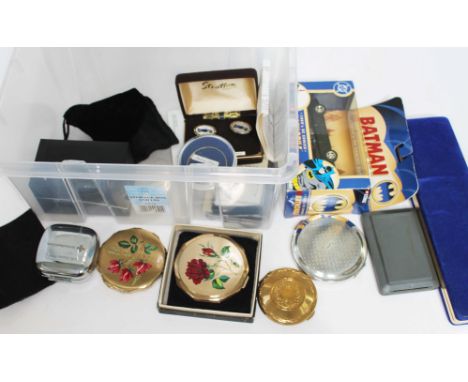 A box of collectables including Oleg Cassini boxed watch, Sekonda boxed watch, a lighter, compact cases, boxed Batmobile toy,