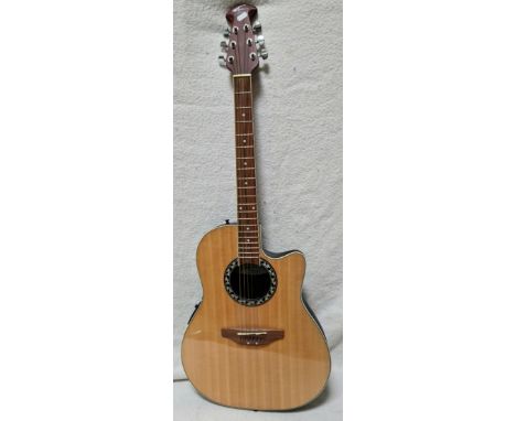 An Applause electro-acoustic guitar model no AE-128  