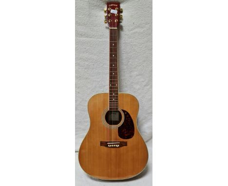 A C Giant acoustic guitar, model 4005-650-2 with black soft case.  