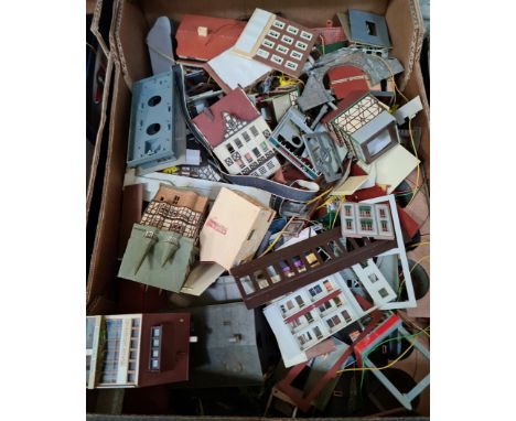 A box of model railway buildings.  
