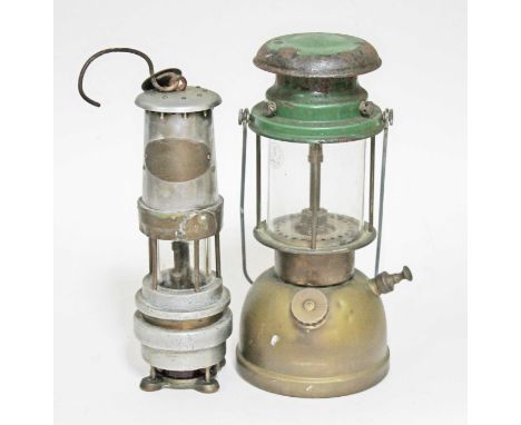 A miner's lamp and a paraffin lamp.  