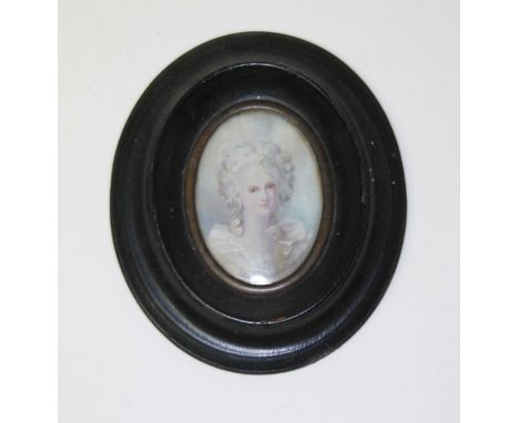 A miniature portrait on ivory, oval frame 11cm x 9cm.  