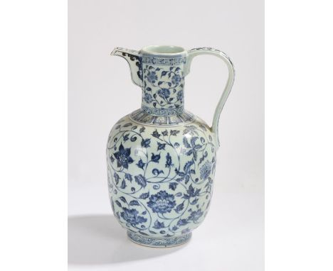 Chinese Ming style porcelain ewer, the neck with spout and scroll decorated handle above a bulbous foliate decorated  body, 3