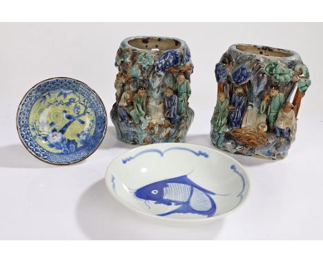 Pair of 20th Century Chinese pottery vases, each in the form of figures sitting under a tree, in blue and green glazes, each 