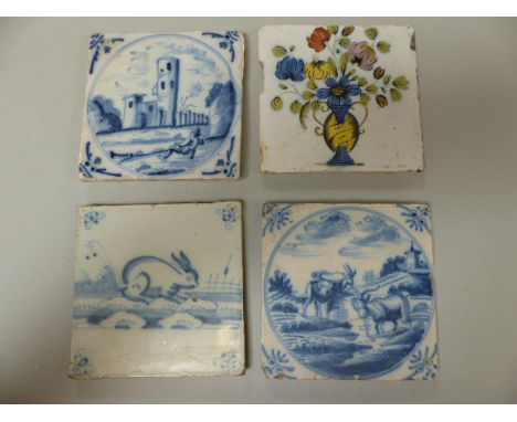 Four Delftware tiles - 1) Decorated in Polychrome colours depicting a vase of flowers. 2) An Early blue and white depiction o