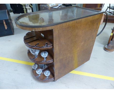 BETJEMAN - A Mid Century drinks trolley/cabinet with birds eye maple veneer. Metal loop handles with cupboard one end, the ot