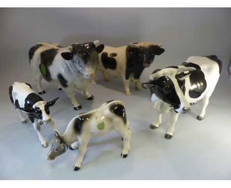 Selection of Friesian cows - to include Vaga international Cow and Calf, Melba Ware Bull and calf and a Cooper Craft bull. 