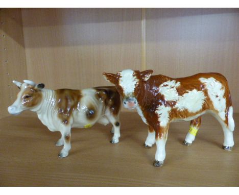 Goebel figure of a bull and one other unmarked cow.