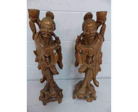 Oriental: Pair of Carved wooden Chinese figures Approx 59cm high) depicting fishermen with their catch (converted to lamp bas