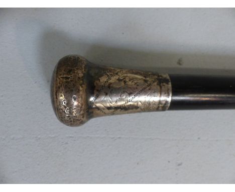 Hallmarked silver topped cane with ebonised stick. Hallmarks for London 1901