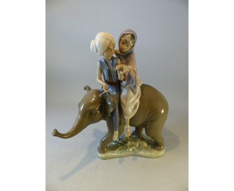 Lladro Hindu figure group of children sat upon an Elephant. No 5352. 