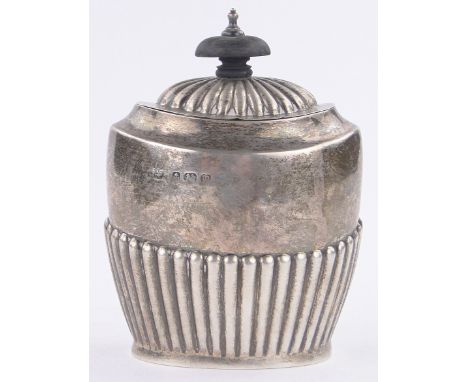 An Edwardian oval silver tea caddy,of half fluted form, Birmingham 1911, height 11cm.