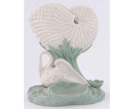 A Victorian Worcester porcelain nautilus shell and swan design table centre spoon warmer,height 21cm.