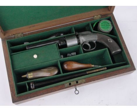 A mid 19th century transitional revolver,octagonal rifled barrel marked W Jones maker, 6 shot percussion cylinder with engrav