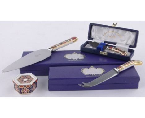 A group of Royal Crown Derby china,comprising 3 boxed butter knives and a small trinket box, (4).