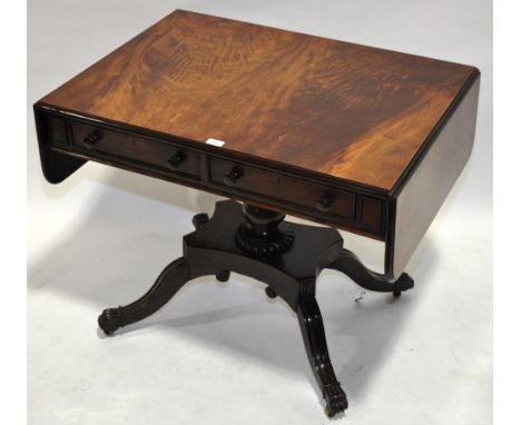A Regency mahogany sofa table,with 2 frieze drawers, raised on a turned centre column and raised platform base, width 2'10" e