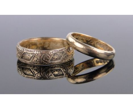 A 19th century unmarked gold engraved band ring,dated 1881, size R, 3.9g and a 22ct wedding band 4.2g, (2).