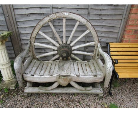 Unusual wagon wheel garden bench