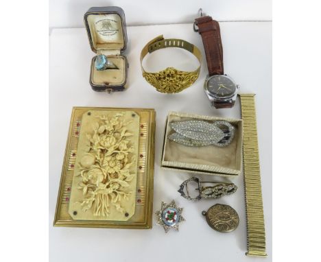 A small collection of costume jewellery, including; a gentleman's Smiths Empire wrist watch; a paste set ring; and a metal an