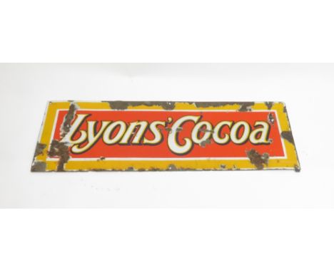 A vintage enamel sign Lyons' Cocoa, 89cm long, 30cm high