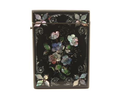 A papier-m«chª visiting card case, circa 1840, hinged lid, black ground, one side with a panel of painted and mother-of-pearl