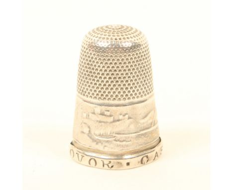 A rare silver thimble, the frieze depicting Dover Castle, the rim impressed 'Dovor Castle'.   Note the mis-spelling of 'Dovor