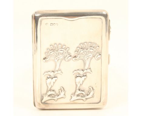 A heavy silver visiting card case, side opening, one side with two Art Nouveau style flowerheads, the reverse with engraved m