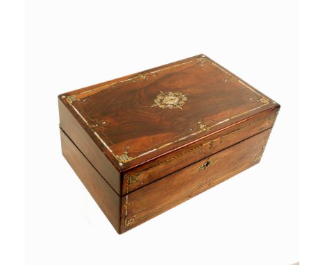 A rosewood rectangular writing box, circa 1850, the lid and front inlaid with engraved brass, brass wire and mother-of-pearl,