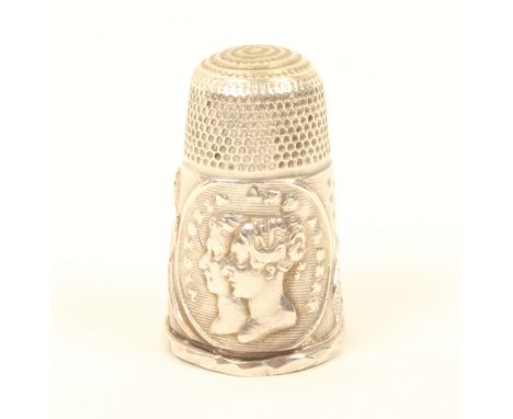 A rare silver thimble commemorating the wedding of Queen Victoria, with oval double bust portrait inscribed 'Victoria and Alb