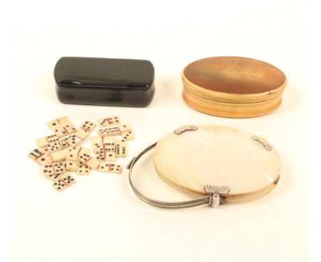 A mixed lot, comprising; a 19th century oval horn box, a papier-m«chª snuff box, containing miniature dominoes, 6.7cm, and a 