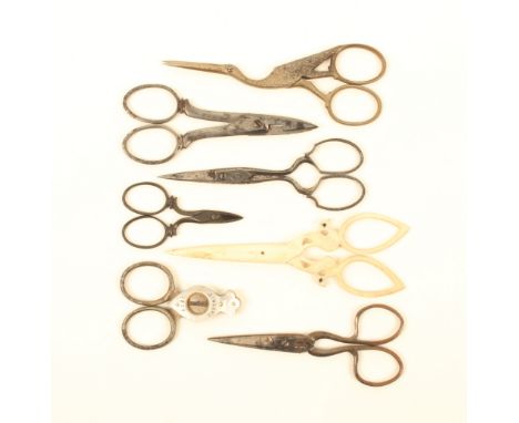 Seven pairs of scissors, comprising; an Indian bone pair, arms carved as birds, 11.75cm, five steel pairs including a pair wi