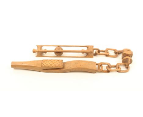 A 20th century chained knitting sheath, probably made by a farmer in Rosedale, Yorkshire, the curving sheath with belt slot t