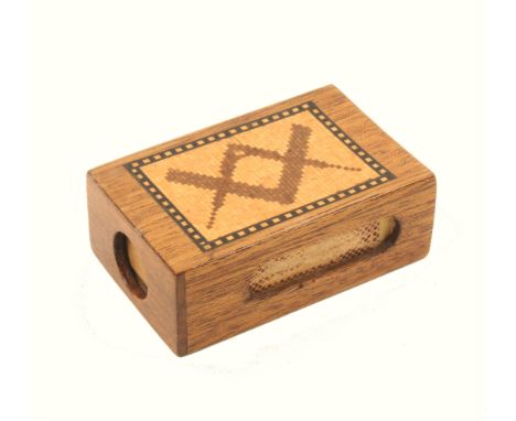 A late Tunbridge ware mahogany Masonic matchbox holder, one side with a mosaic panel of compass and set square within geometr