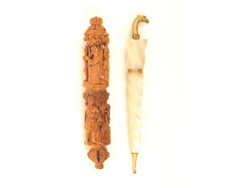 Two good needlecases, comprising; a Palais Royal mother-of-pearl example, in the form of a furled umbrella, gilt ferrule, joi