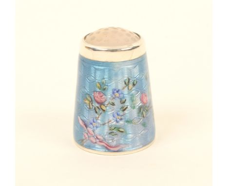 A Norwegian silver thimble, the blue basse-taille ground decorated with multi-coloured flowers and leaves below a moonstone t