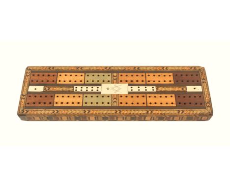 A Tunbridge style Masonic cribbage board of rectangular form, with ornate coloured feather inlay borders and sides, the top w