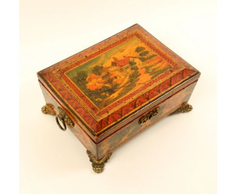 A Regency painted whitewood sewing box, possibly early Tunbridge ware, of sarcophagus form, the lid brightly painted with rur