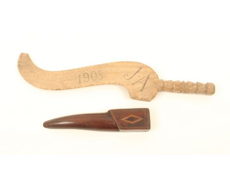 Two knitting sheaths, comprising; a curved pale wood example, dated and initialled '1904 - J.A.', with geometric step cut ste