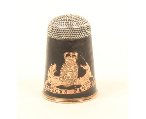 A rare Piercy's Patent thimble, the body in tortoiseshell over a gilt rim with inset Royal coat of arms above a scroll 'Pierc