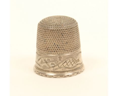 An unusual large silver thimble, by Charles Horner, probably a sample, wriggle engraved border, over a faceted rim, 2.5cm hig