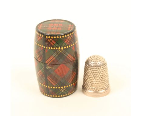 A Tartan ware thimble barrel (Prince Charles), gilt dot borders, velvet lined interior with silver thimble, 4cm high.(From Th