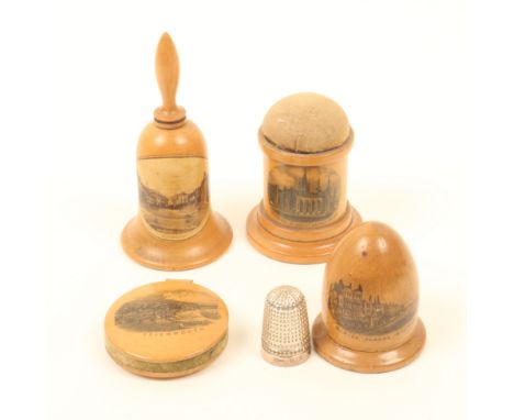 Four pieces of Mauchline ware, comprising; a bell shaped tape measure (Lyndhurst - photographic), 8cm, a standing thimble egg