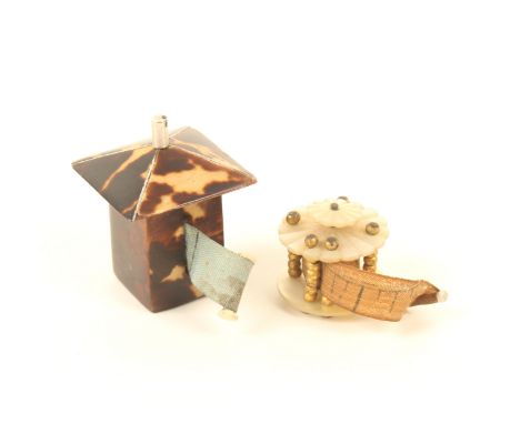 Two tape measures, comprising; a tortoiseshell example of square form, with overhanging top and white metal spindle wind, pri
