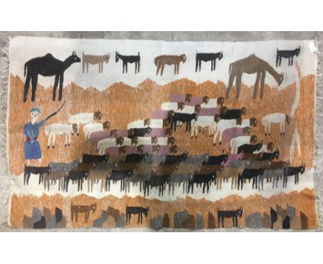 Style of RAMSES WISSA WASSEF SCHOOL (1911-1974) Egyptian, An Egyptian tapestry, worked with a goat herder and his flock and t